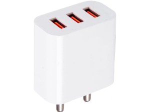 A white USB charger and adapter on a wooden surface.